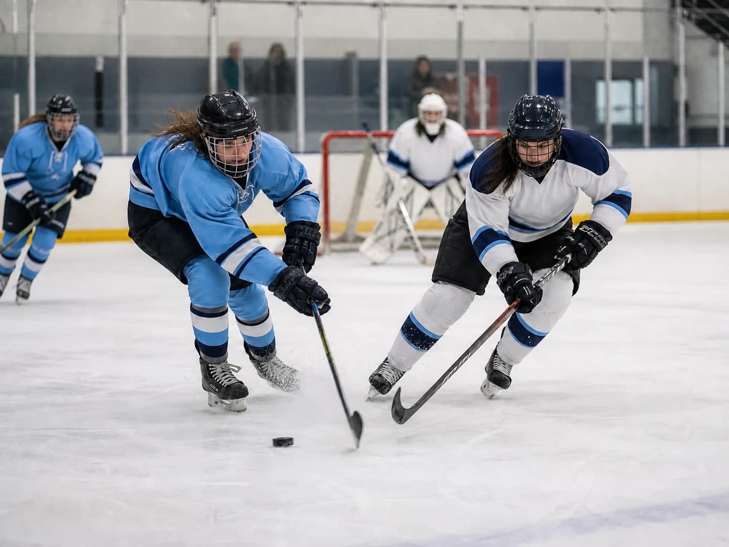 Ice hockey players racing for the puck during a club game
